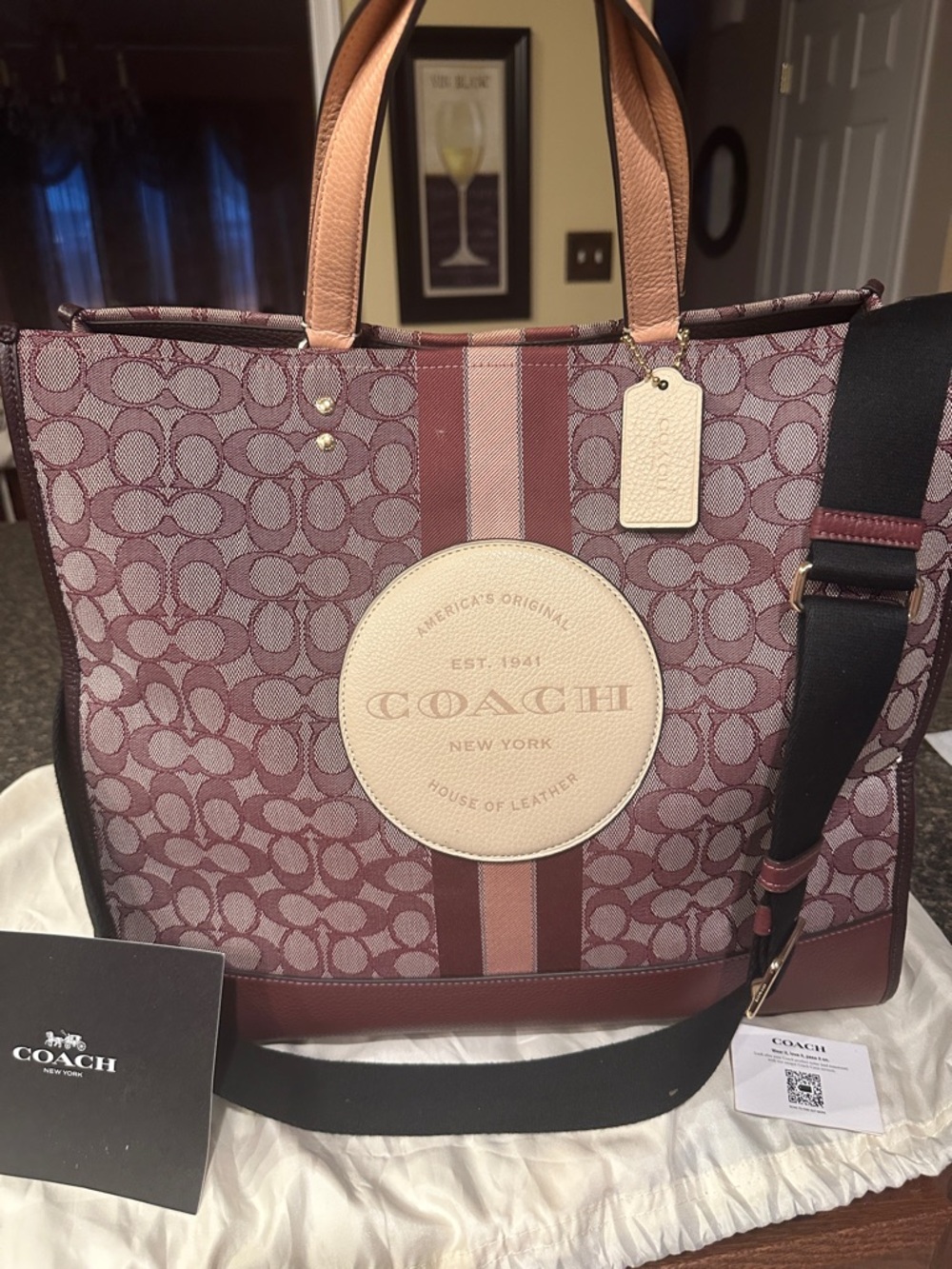 COACH Dempsey 40 in Wine w/beige patch and hang tag and pink top handles C8418